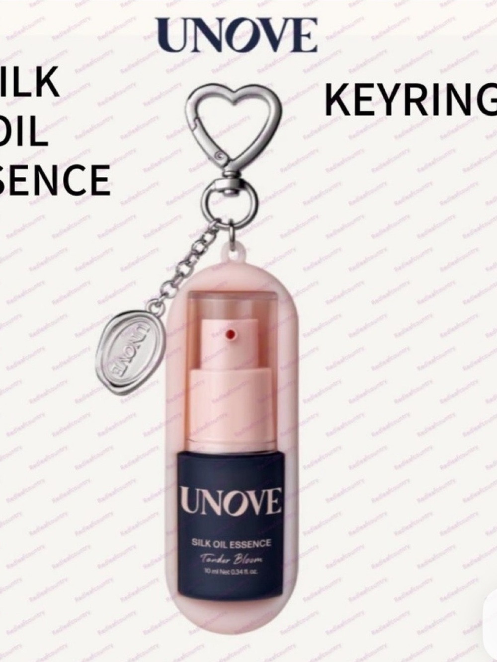 FREE w/ purchase Unove Silk Oil Essence in Tender Bloom 10ml in keychain